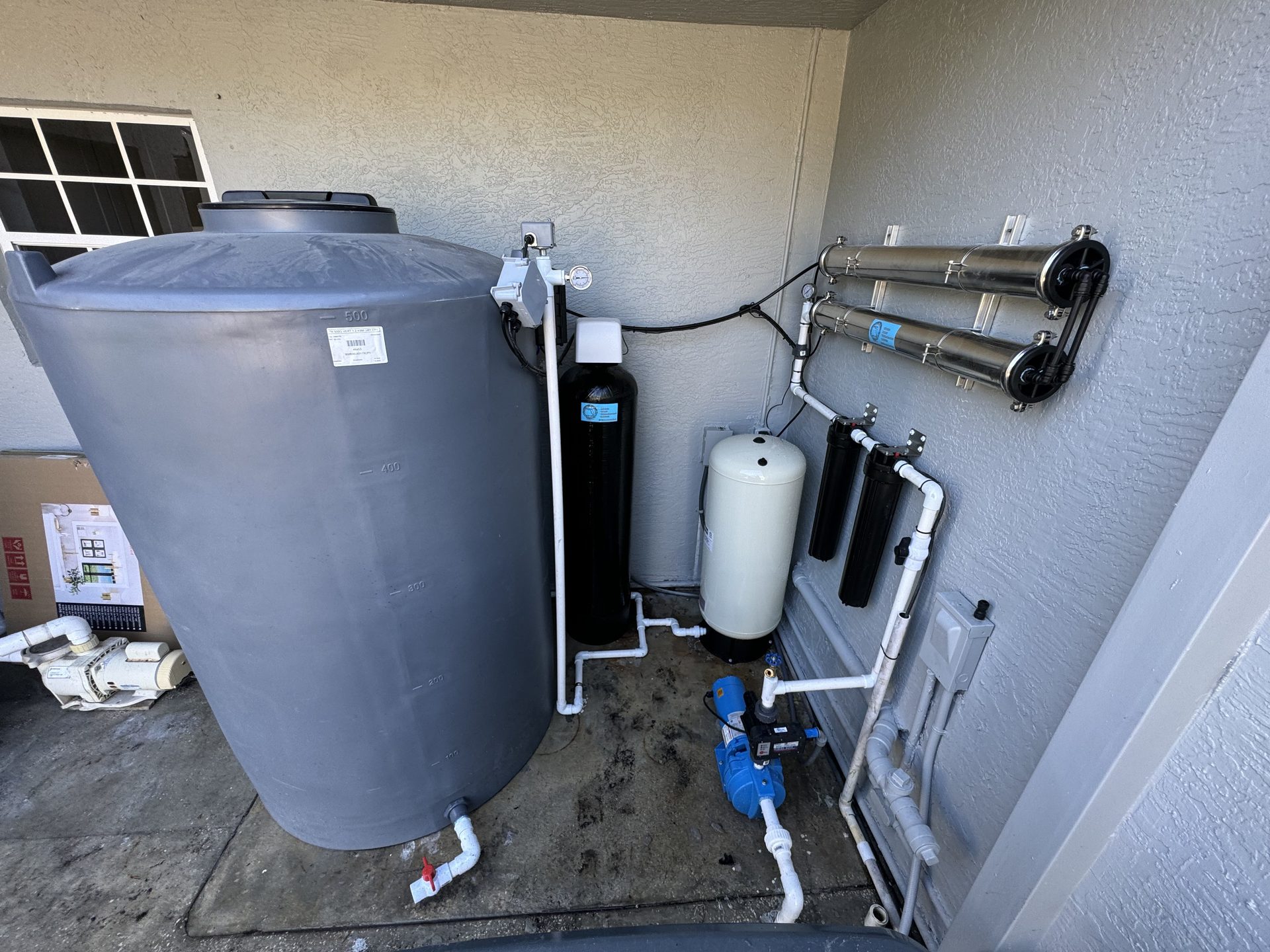 Whole-home reverse osmosis system with storage tank installed in Palm Beach County by Advanced Water Solutions